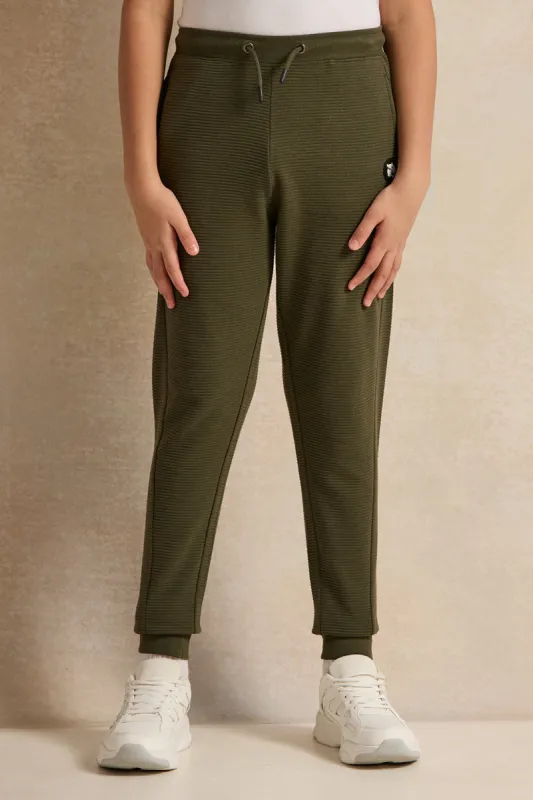 Senior Boys Olive Ottoman Ribbed Active Pants sold by Redtag