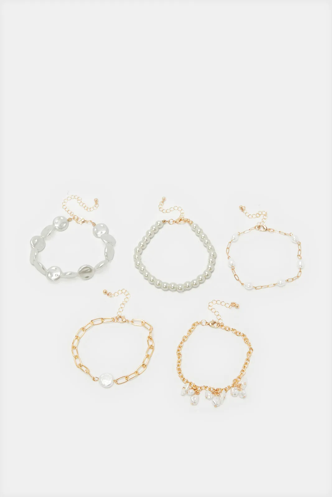Women Gold Embellished Bracelets Set (5 Piece) sold by Redtag