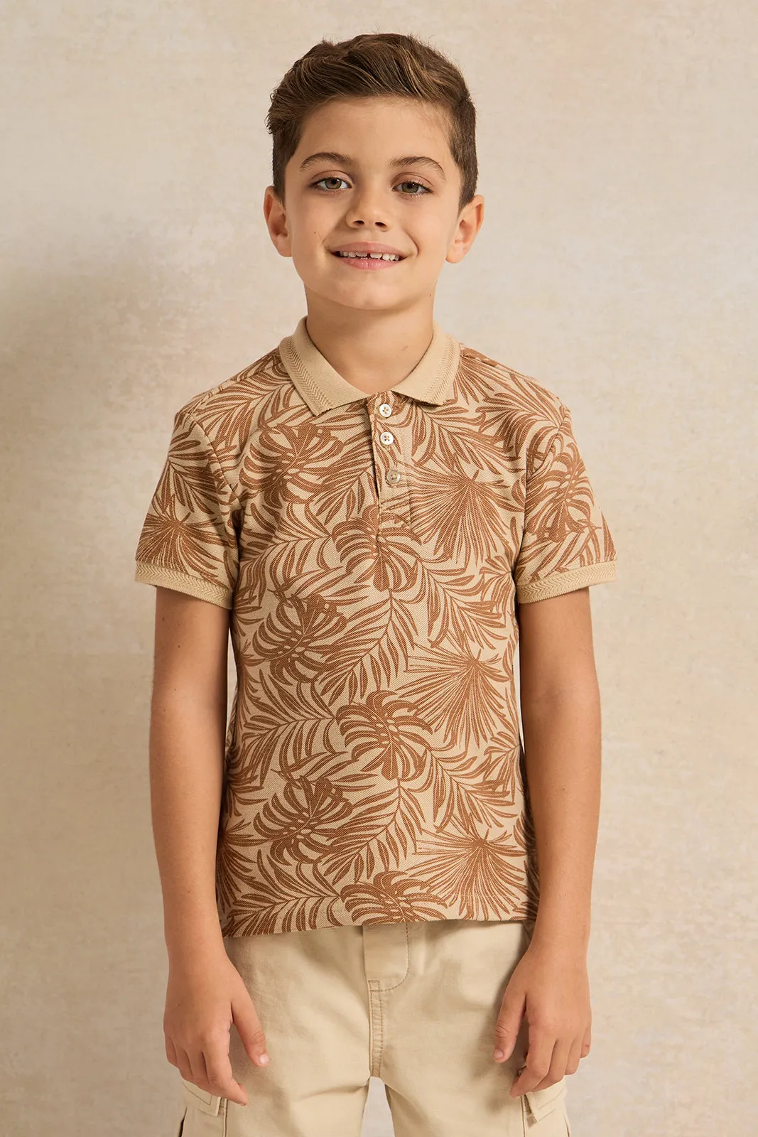 Boys Beige Printed Polo Shirt sold by Redtag