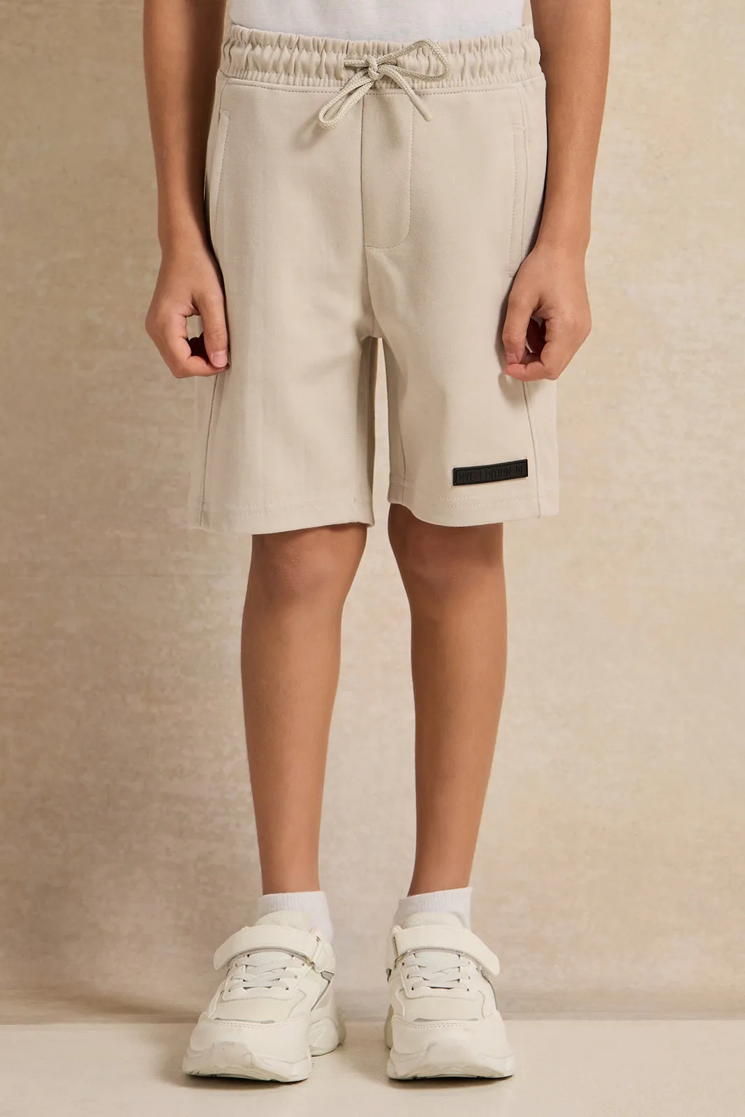 Boys Beige Shorts sold by Redtag