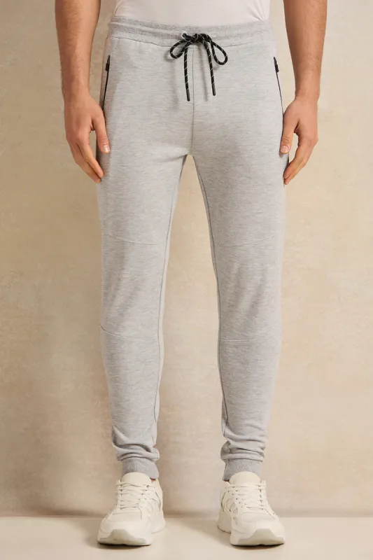 Men Grey Solid Active Pants sold by Redtag
