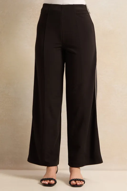Women Black Contrast Piping Trousers sold by Redtag