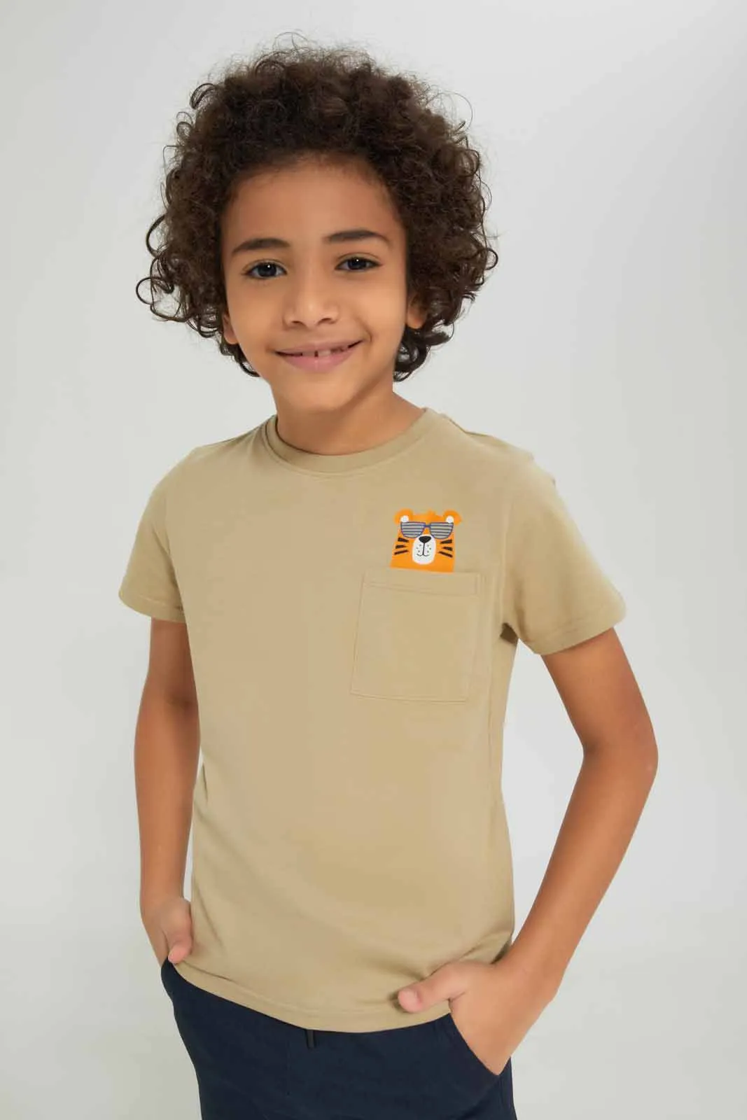 Boys Beige Lion Printed Pocket T-Shirt sold by Redtag