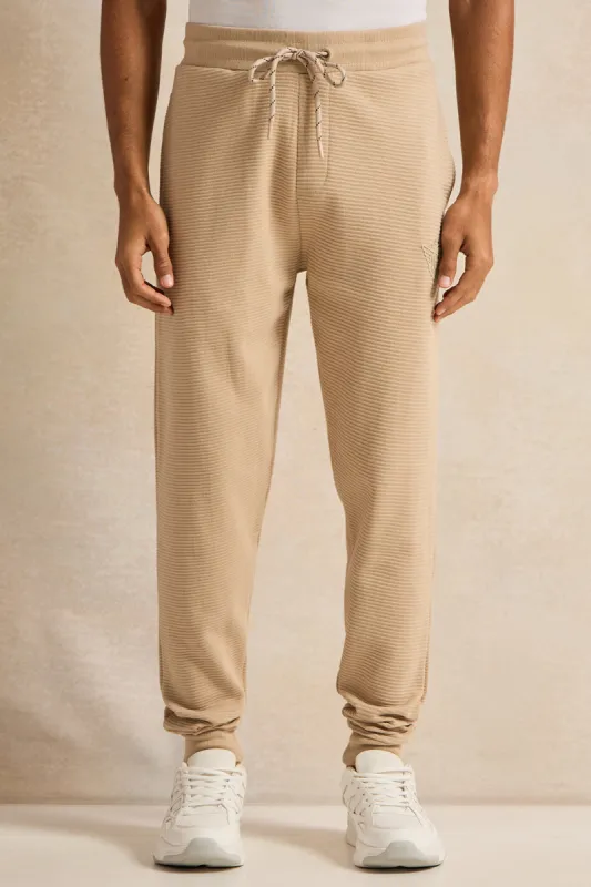 Men Beige Logo Print Active Pants sold by Redtag