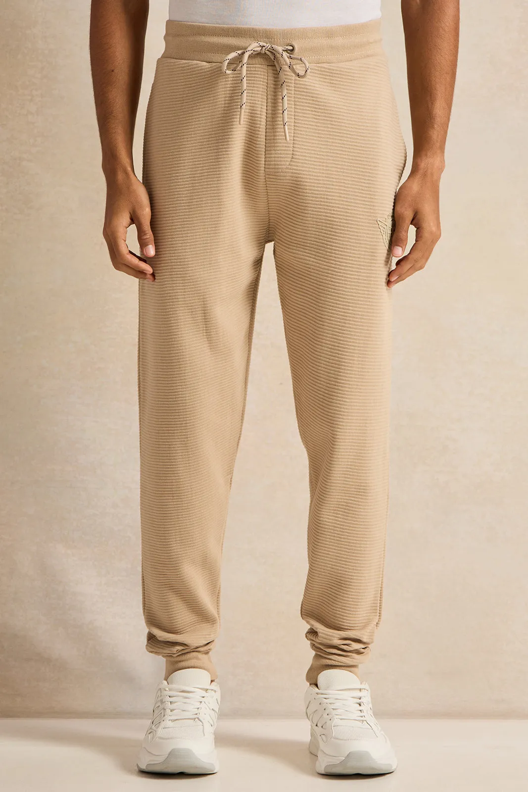 Men Beige Logo Print Active Pants sold by Redtag