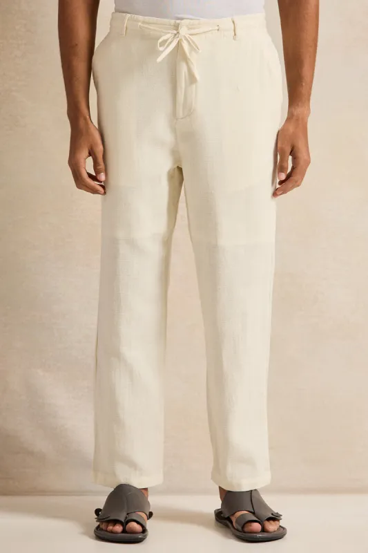 Men Beige Solid Trousers sold by Redtag