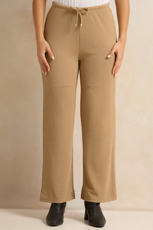 Women Beige Textured Pull-On Trousers sold by Redtag