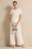 Women White Pearl Embellished Top sold by Redtag