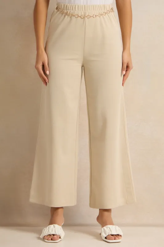 Women Gold Metal Chain Knit Flared Leg Trouser sold by Redtag