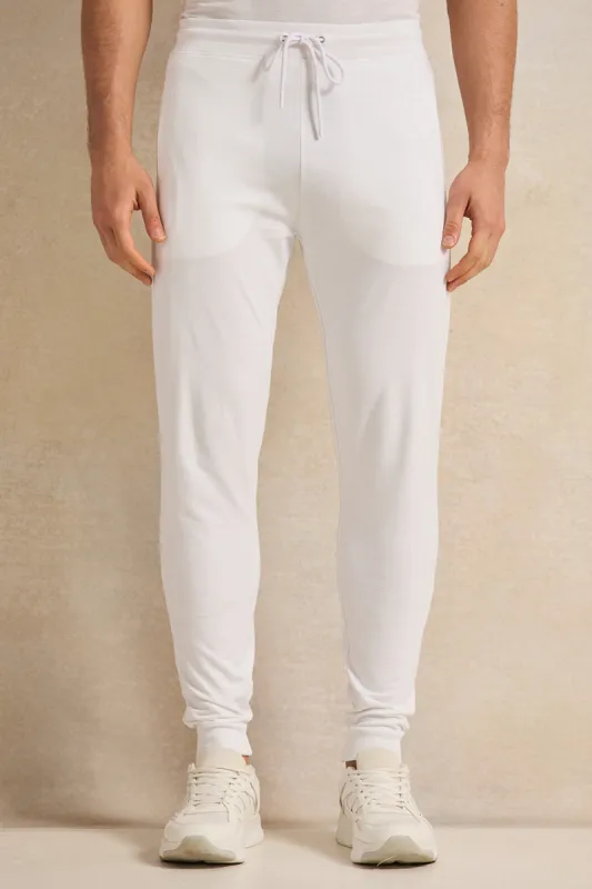 Men White Basic Track Pants sold by Redtag