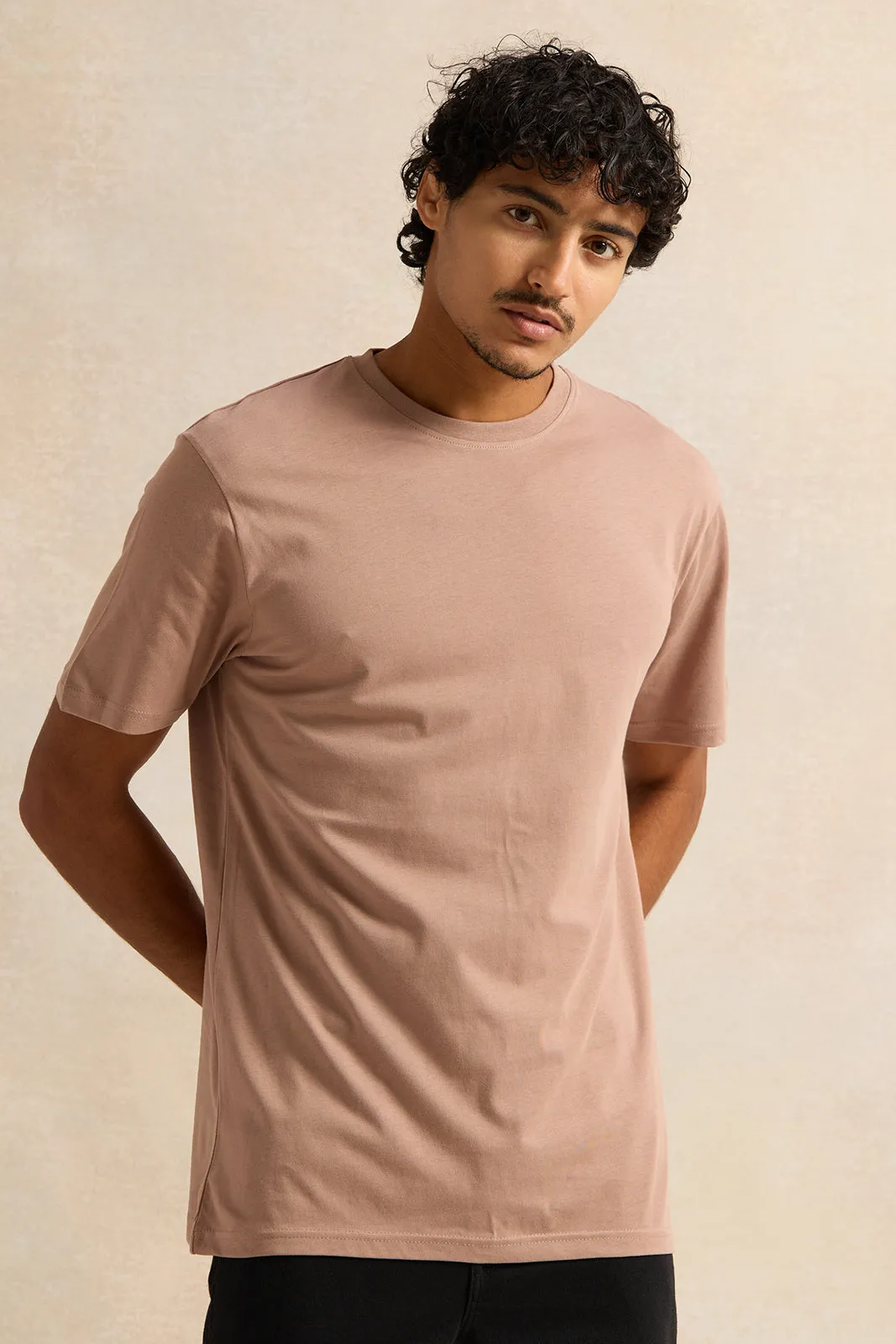 Men Beige Solid T-Shirt sold by Redtag