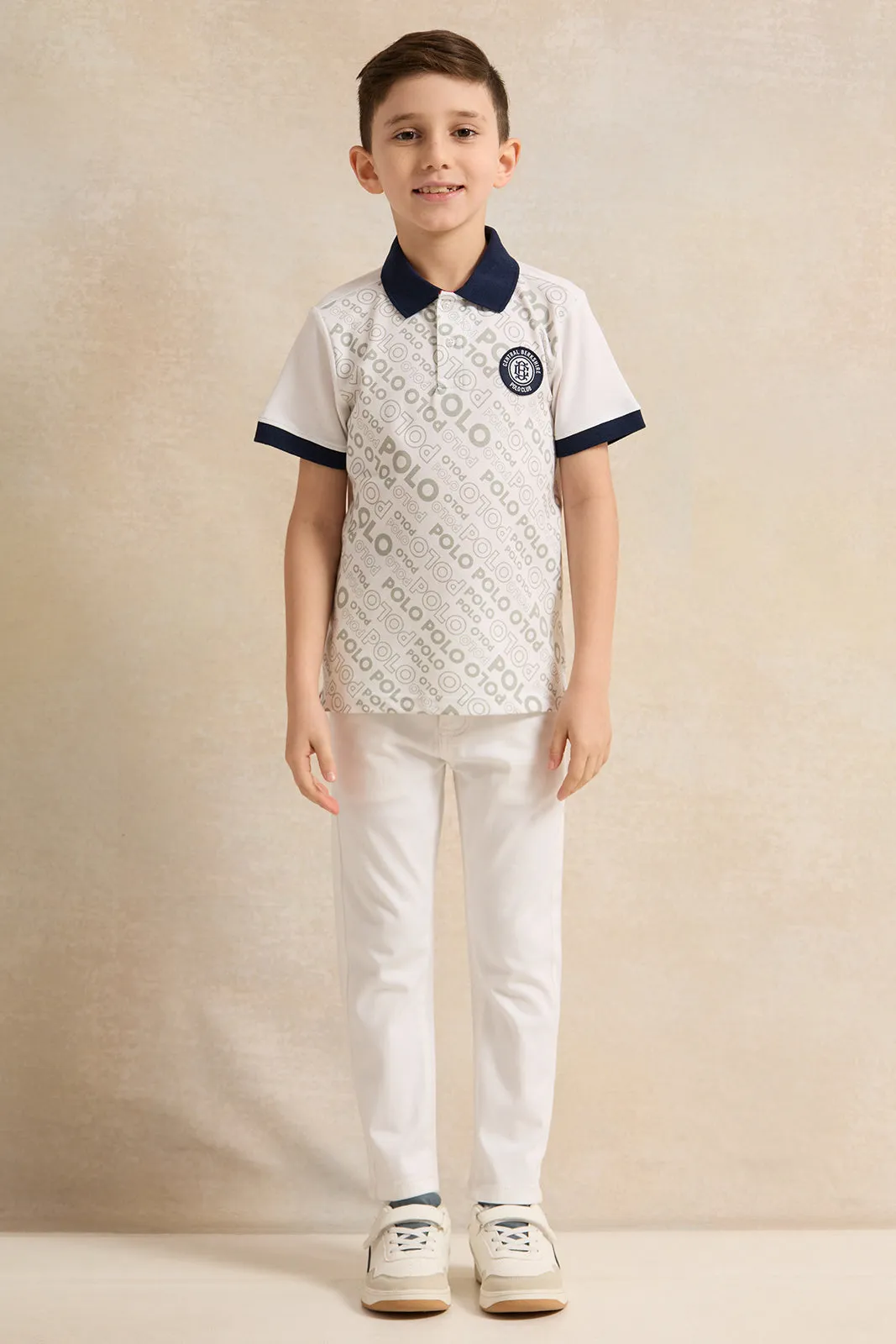 Boys White And Navy Printed Polo Shirt sold by Redtag product image thumbnail 2