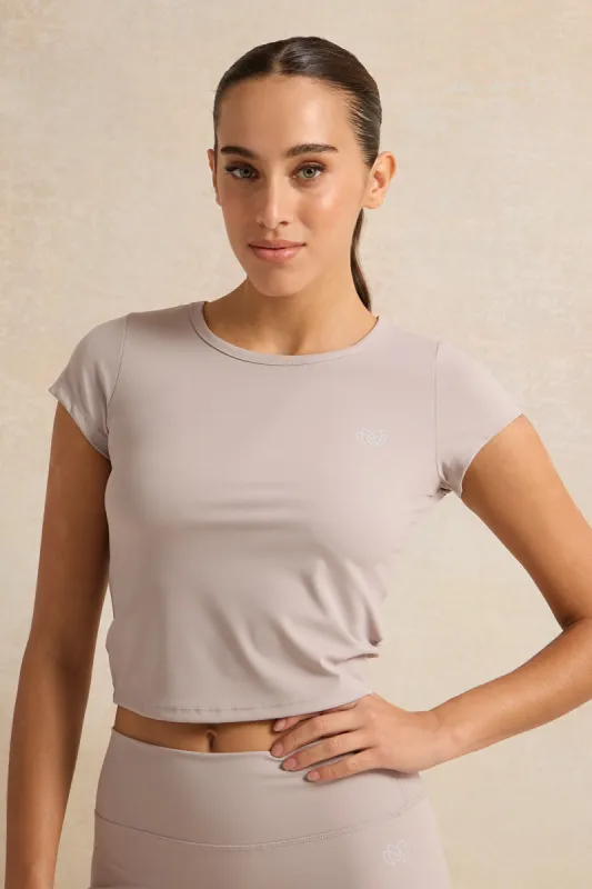 Women Lilac Solid Short Sleeve Active T-Shirt sold by Redtag