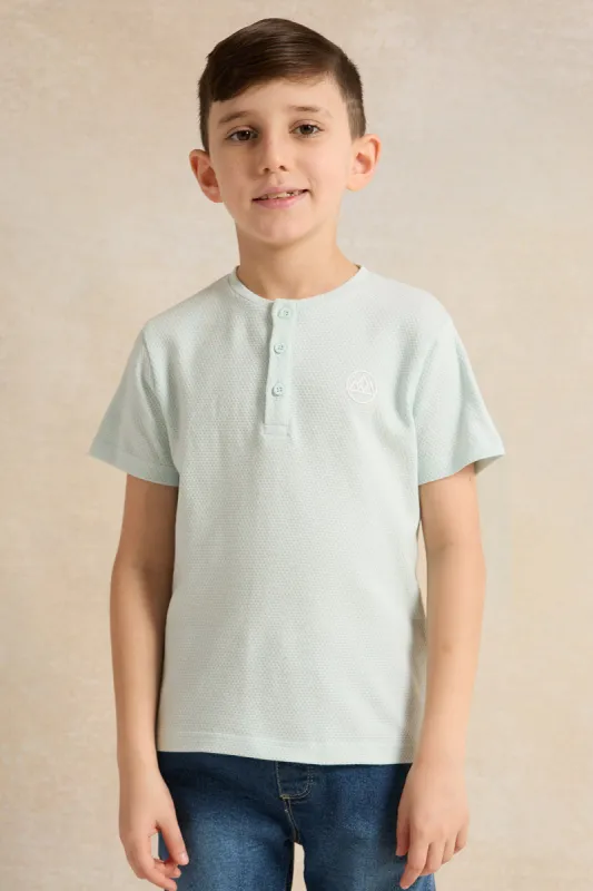 Boys Blue Solid Short Sleeve Henley T-Shirt sold by Redtag
