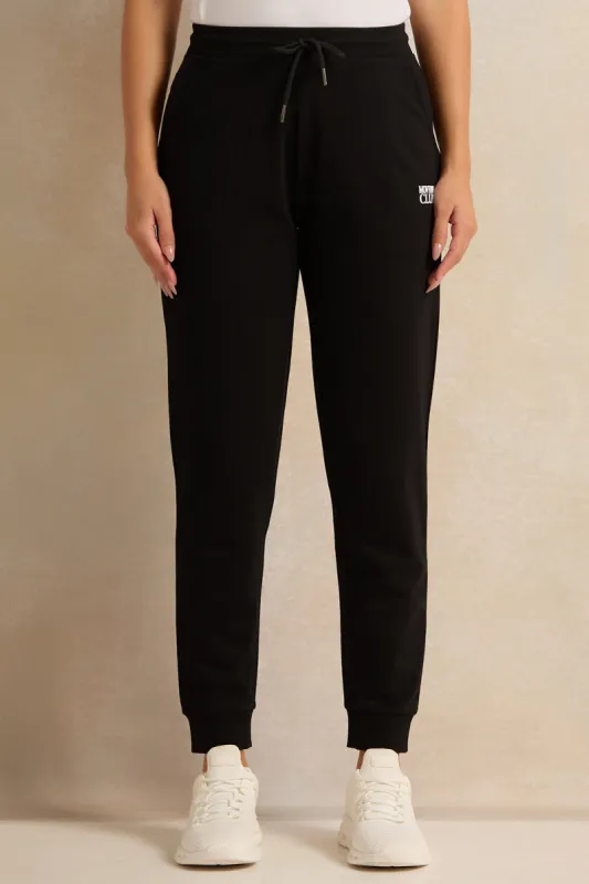 Women Black Printed Jogger Pants sold by Redtag