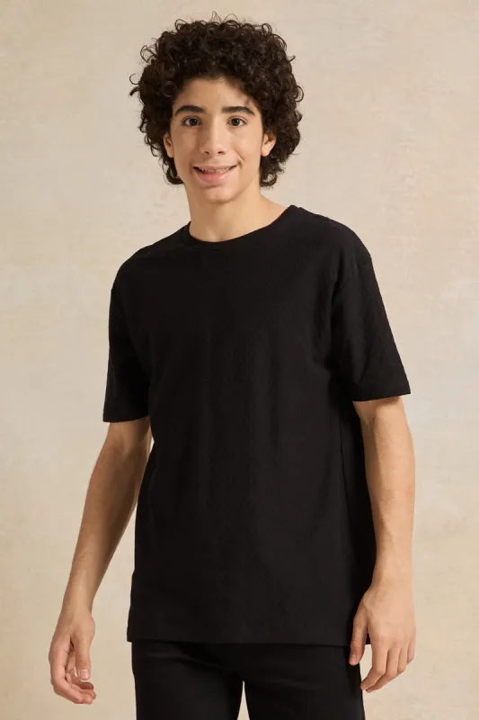 Senior Boys Black Solid  T-Shirt sold by Redtag