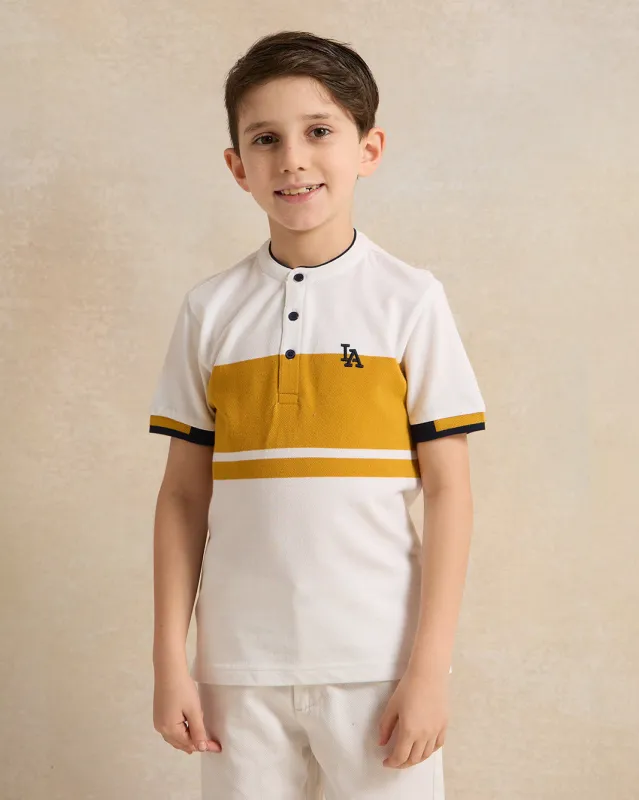 Boys White And Mustard Embroidered Polo Shirt sold by Redtag