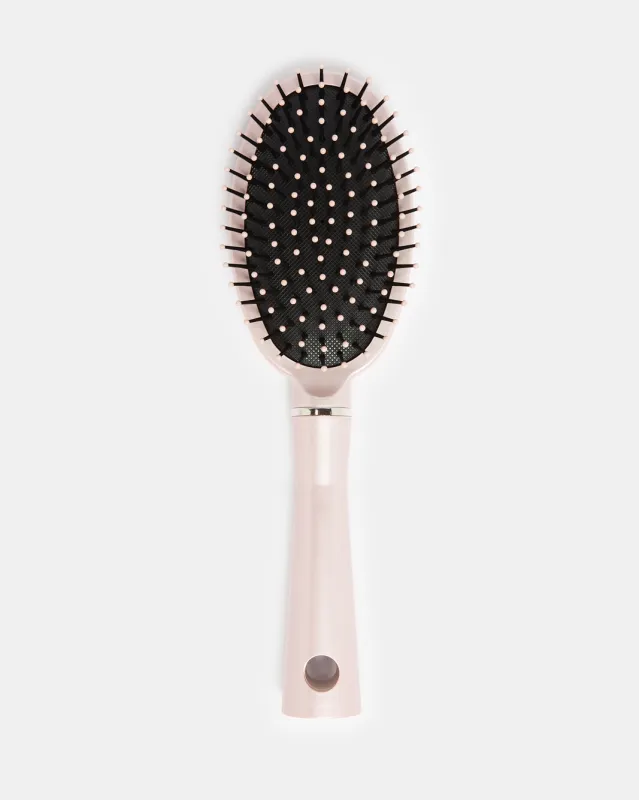 Women Pink Solid Hair Brush sold by Redtag