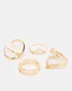 Women Gold Embellished Ring Set (Pack of 4) sold by Redtag