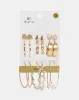 Women Gold Embellished Earring Set (9 Pairs) sold by Redtag