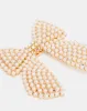Women Gold Embellished Bow Hair Clip sold by Redtag