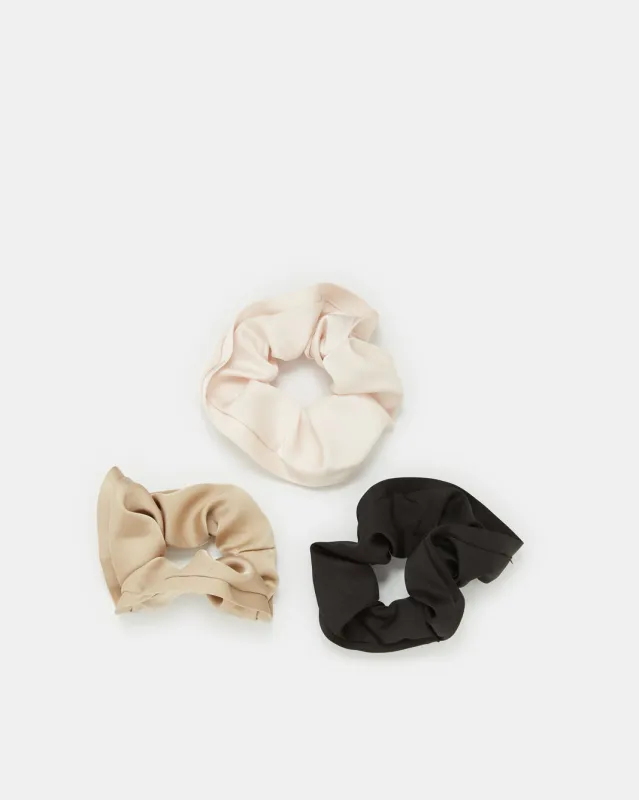 Women Assorted Plain Scrunchy Set (3 Piece) sold by Redtag
