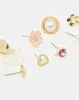 Women Gold Embellished Studs Set (8 Piece) sold by Redtag