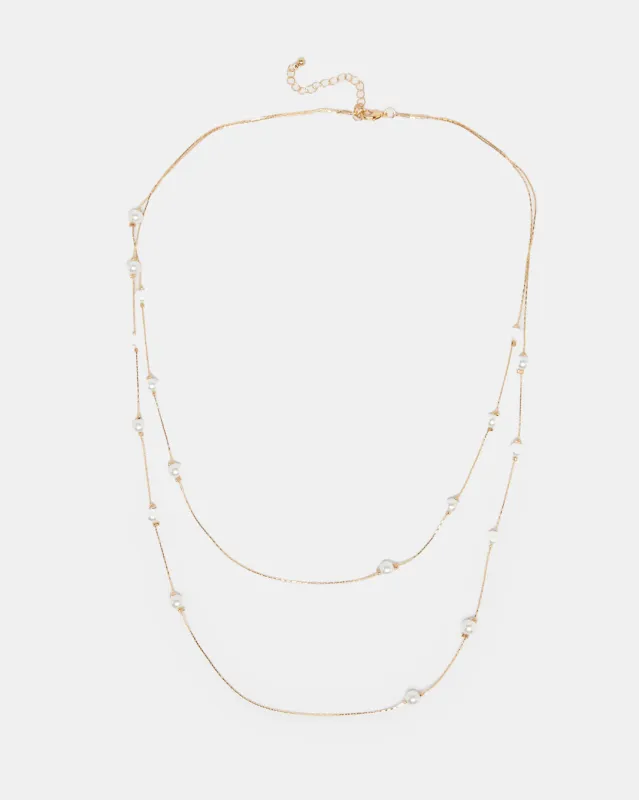 Women Gold Pearl Embellished Necklace sold by Redtag
