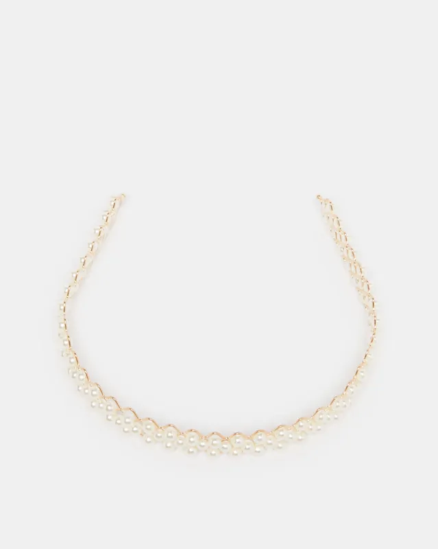 Women Beige Solid Headband sold by Redtag