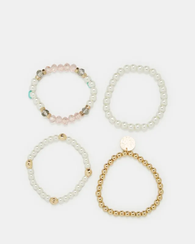 Women Gold And White Embellished Bracelet Set (4 Piece) sold by Redtag
