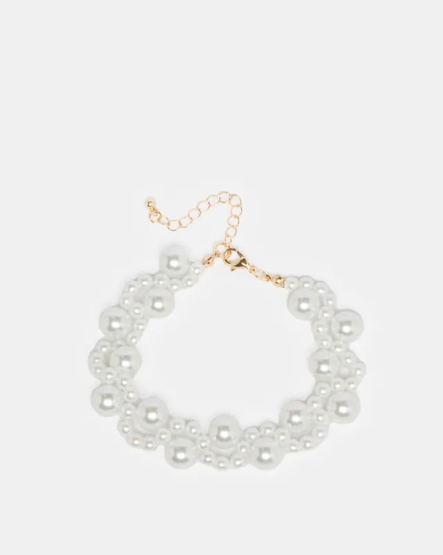 Women White Embellished Pearl Bracelet sold by Redtag