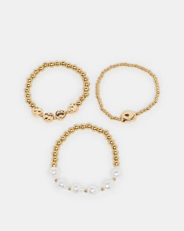 Women Gold Embellished Bracelets Set (3 Piece) sold by Redtag