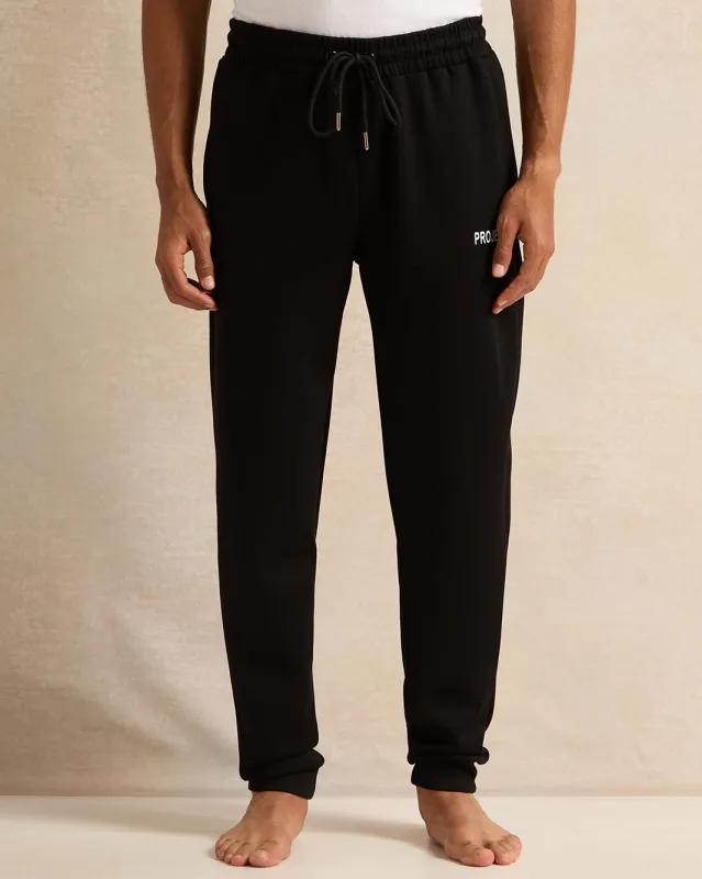 Men Black Placement Print Lounge Pants sold by Redtag