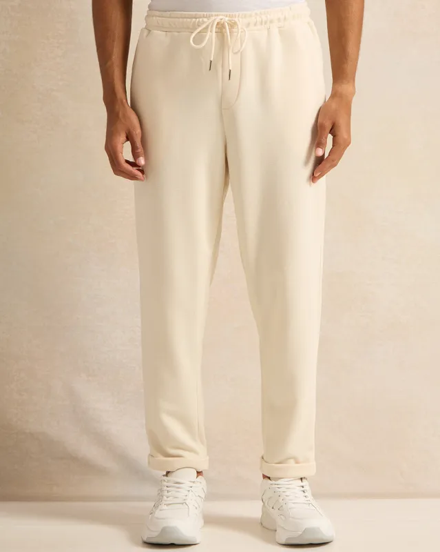 Men Beige Plain Track Pants sold by Redtag