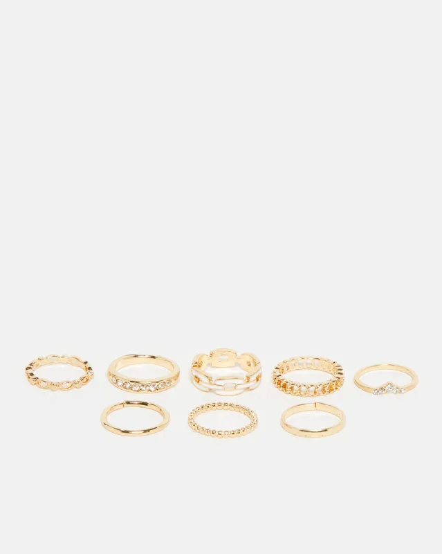 Women Gold Embellished Ring Set (8 Piece) sold by Redtag