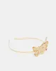 Women Gold embellished Headband sold by Redtag