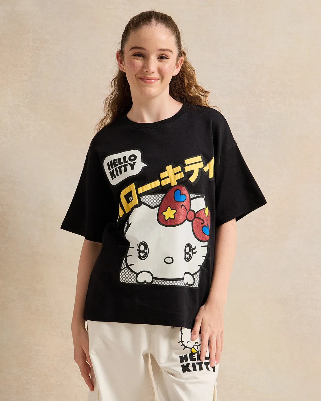 Senior Girls Black Oversize Printed T-shirt sold by Redtag