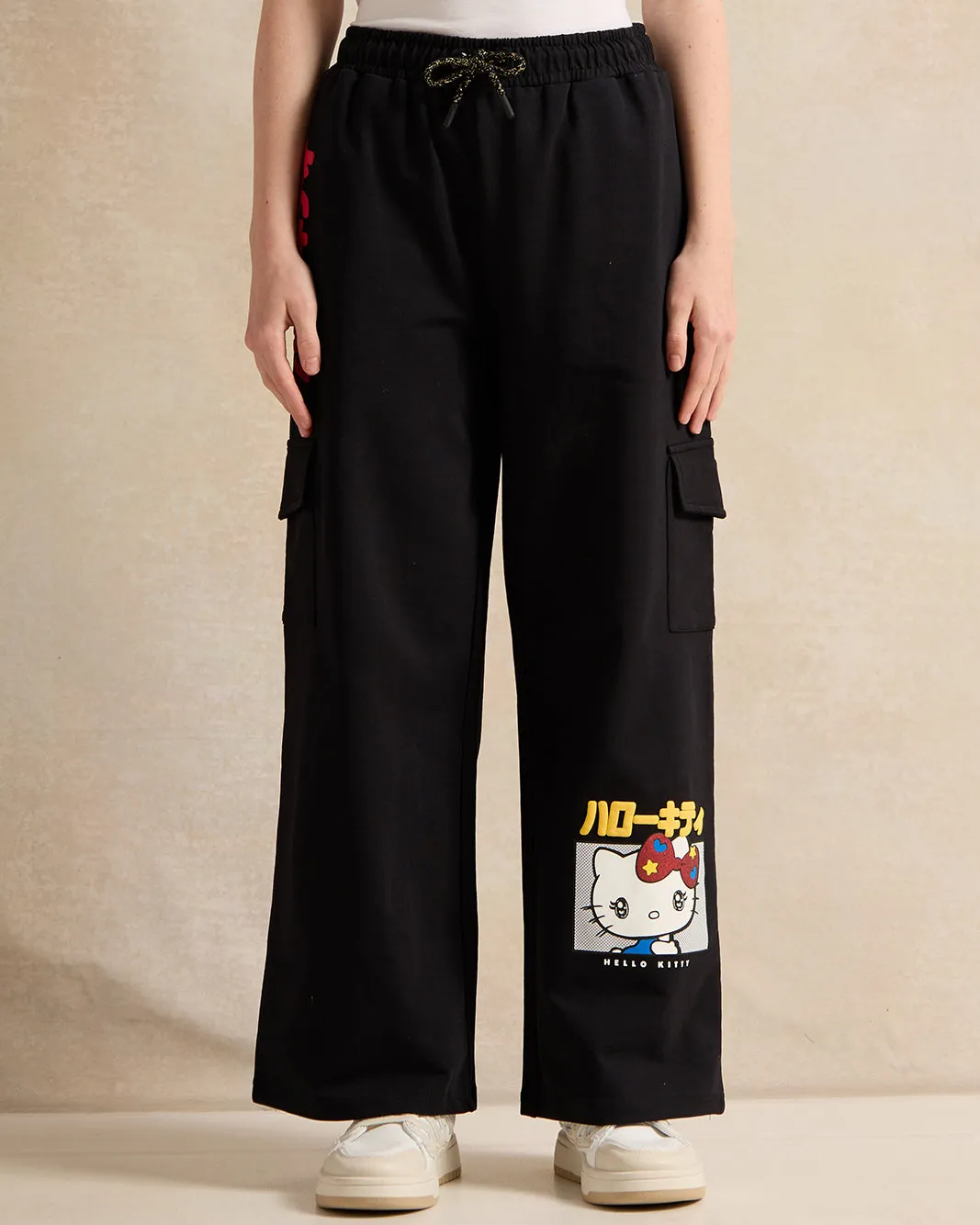 Senior Girls Black Hello Kitty Printed Cargo Pocket Wide Leg Pants sold by Redtag