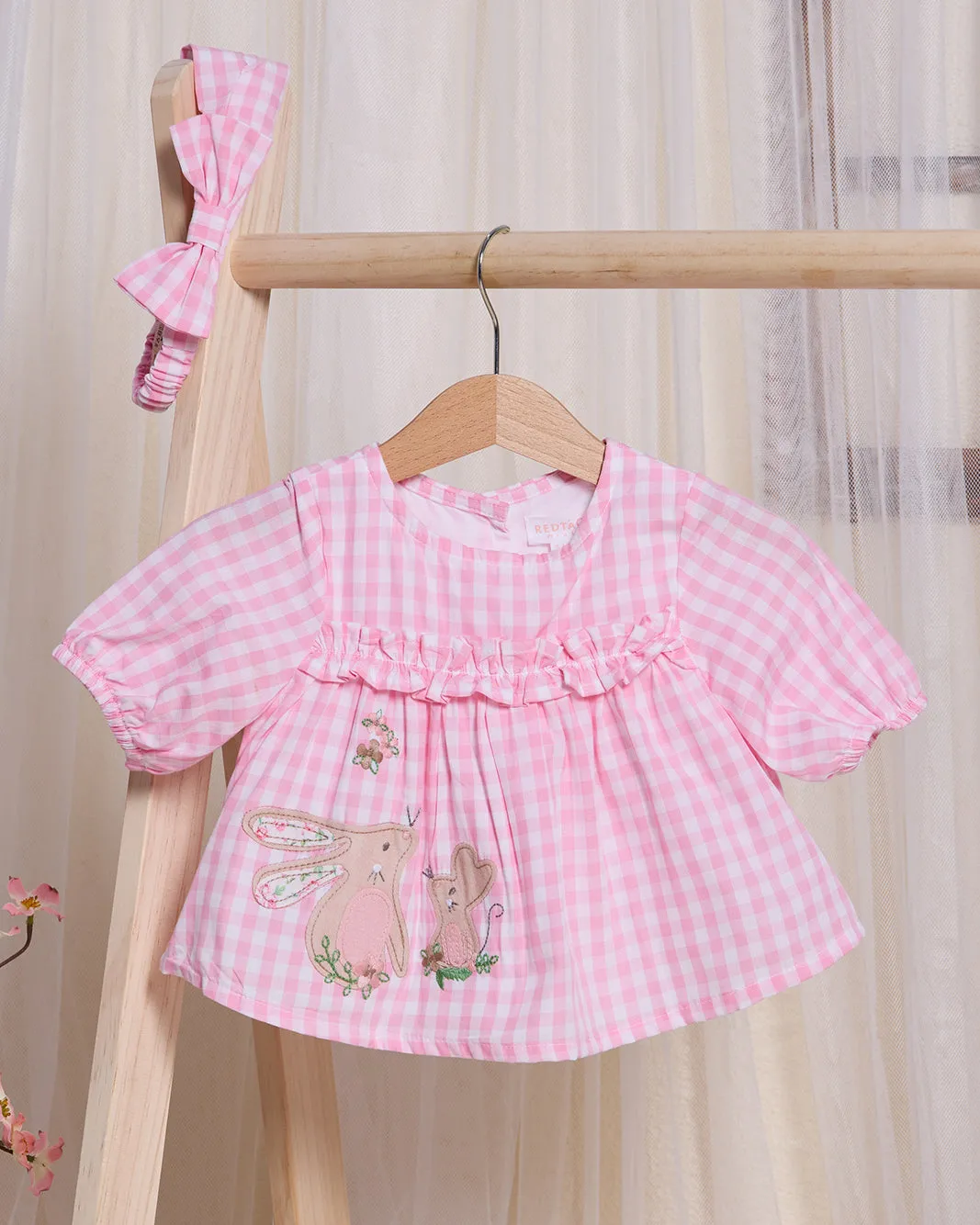 Infant Girls Pink Checkered Dress sold by Redtag