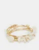 Women Gold Embellished Coil Bracelet sold by Redtag