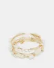 Women Gold Embellished Coil Bracelet sold by Redtag