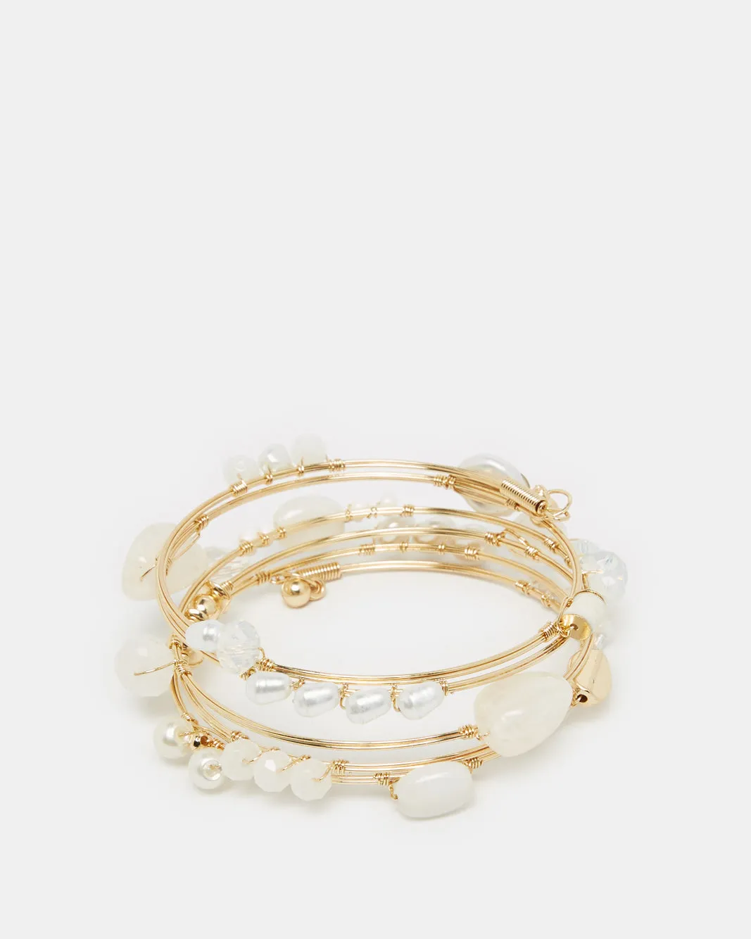 Women Gold Embellished Coil Bracelet sold by Redtag