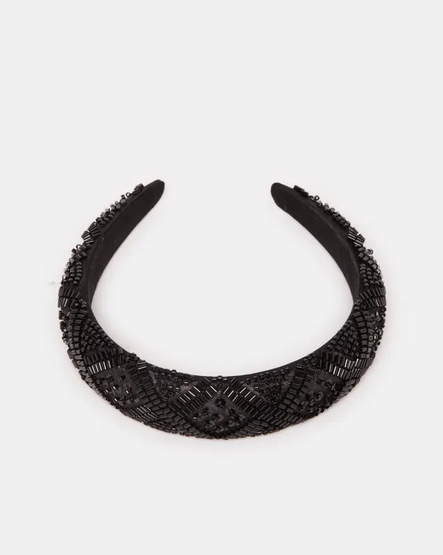 Women  Black Solid Headband sold by Redtag