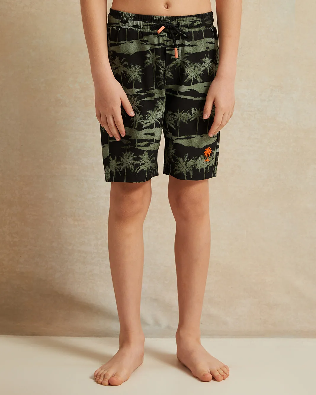Boys Green Palm Print Swim Shorts sold by Redtag