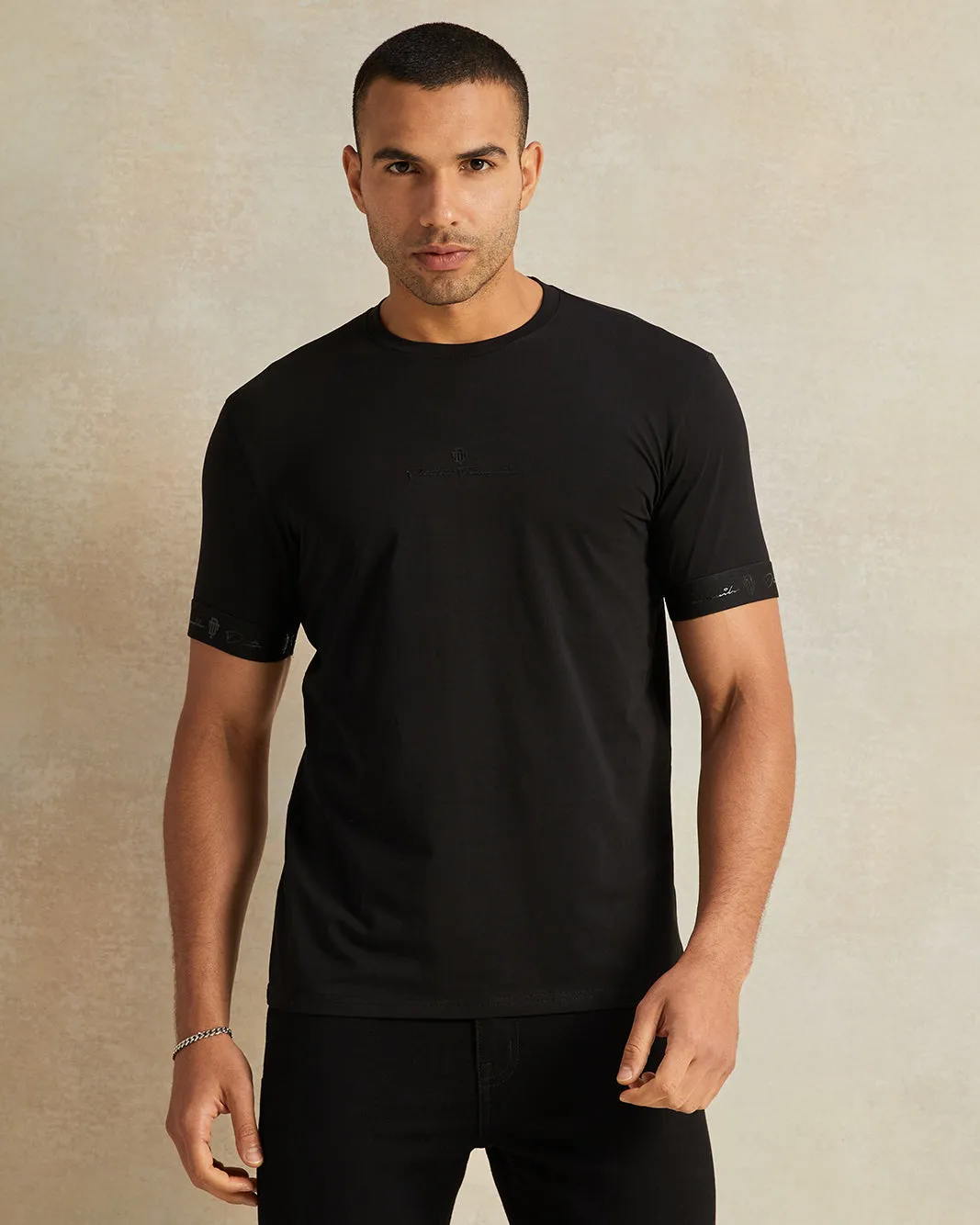 Men Plain Black Soft Touch Varsity T-Shirt sold by Redtag