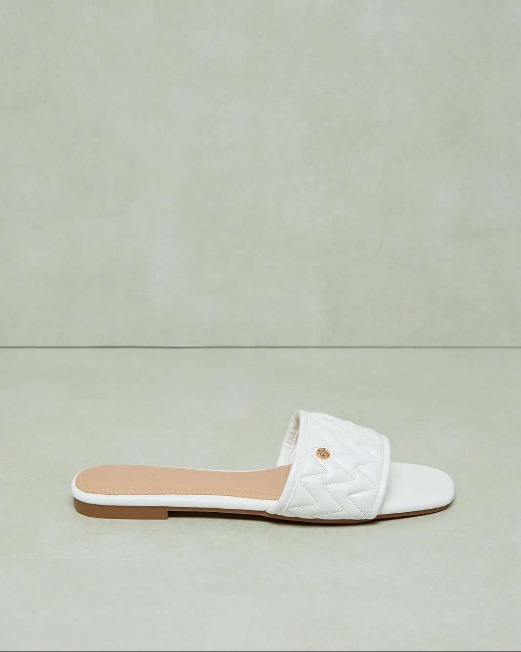 Women White Quilted Mule sold by Redtag