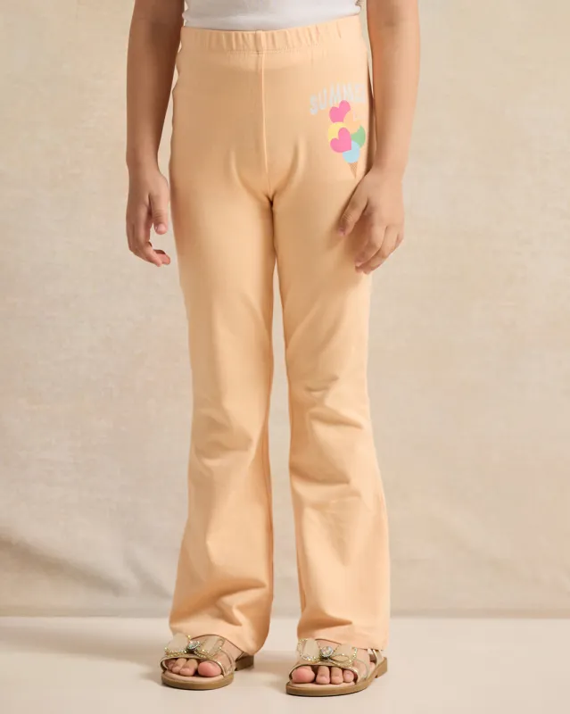 Girls Orange Printed Leggings sold by Redtag