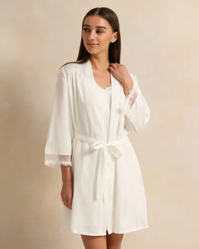 Women White Lace Embellished Robe sold by Redtag