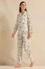 Women White Printed Pyjama Set (2 Piece) sold by Redtag