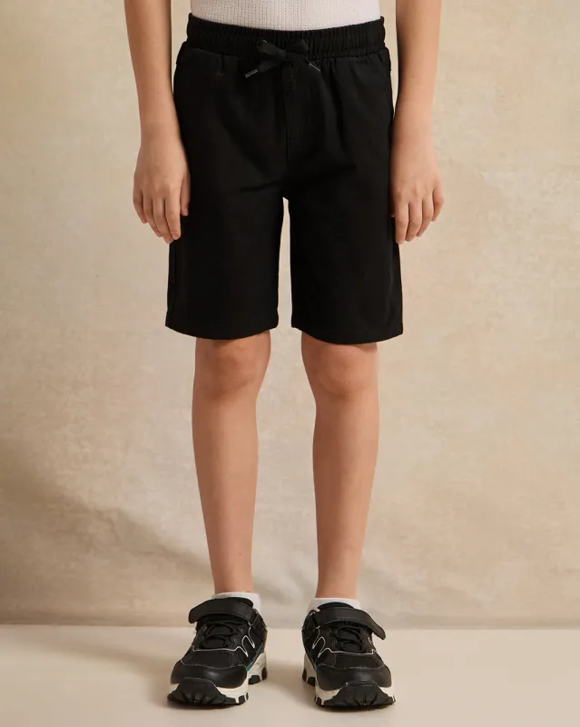 Boys Black Solid Shorts sold by Redtag